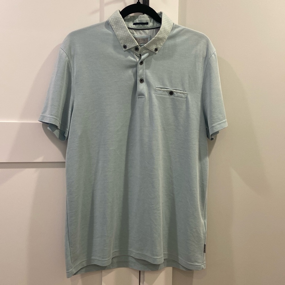This is a Ted Barker London polo in the size large. The color is mint.
